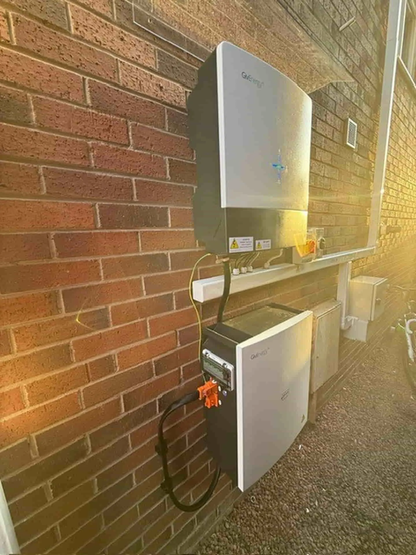 Battery storage and inverter installed on an exterior wall